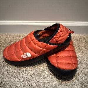 The North Face Orange Puff Slippers